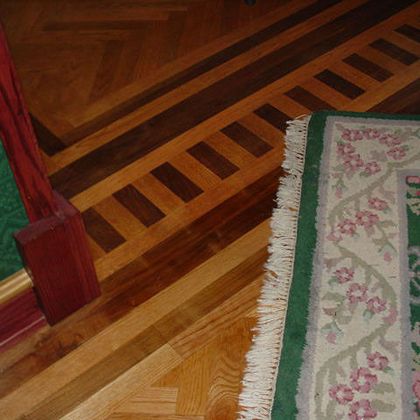 Hardwood floor inlays historic room