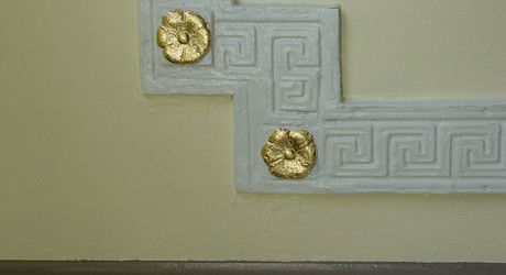 Gilding of Flowers in Plaster Trimwork