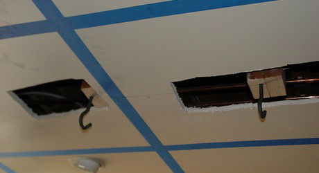 Tin ceiling installation with pot rack